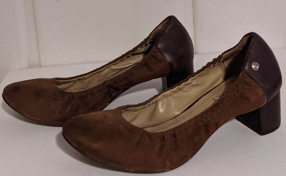 Brown leather and suede kitten pumps.